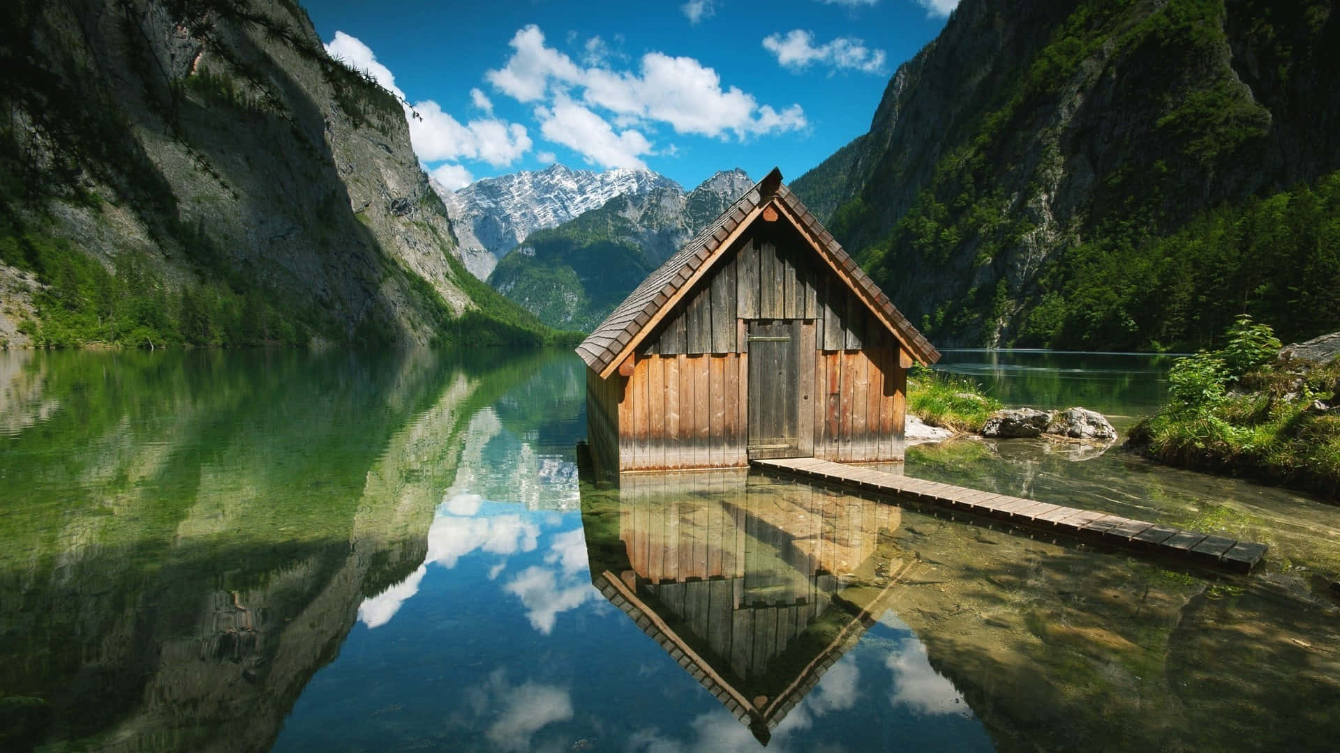 Tiny Cabin By A River Wallpaper