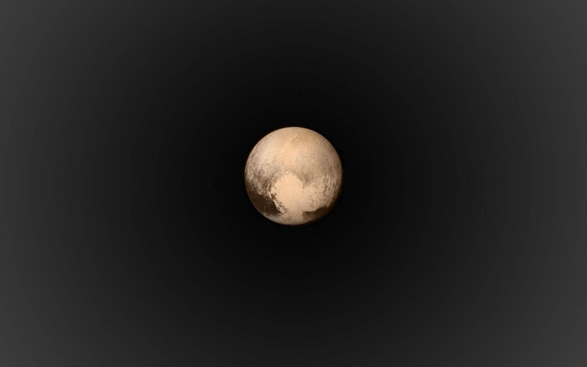 Lille Planet Pluto viser små klippeformede formationer. Wallpaper