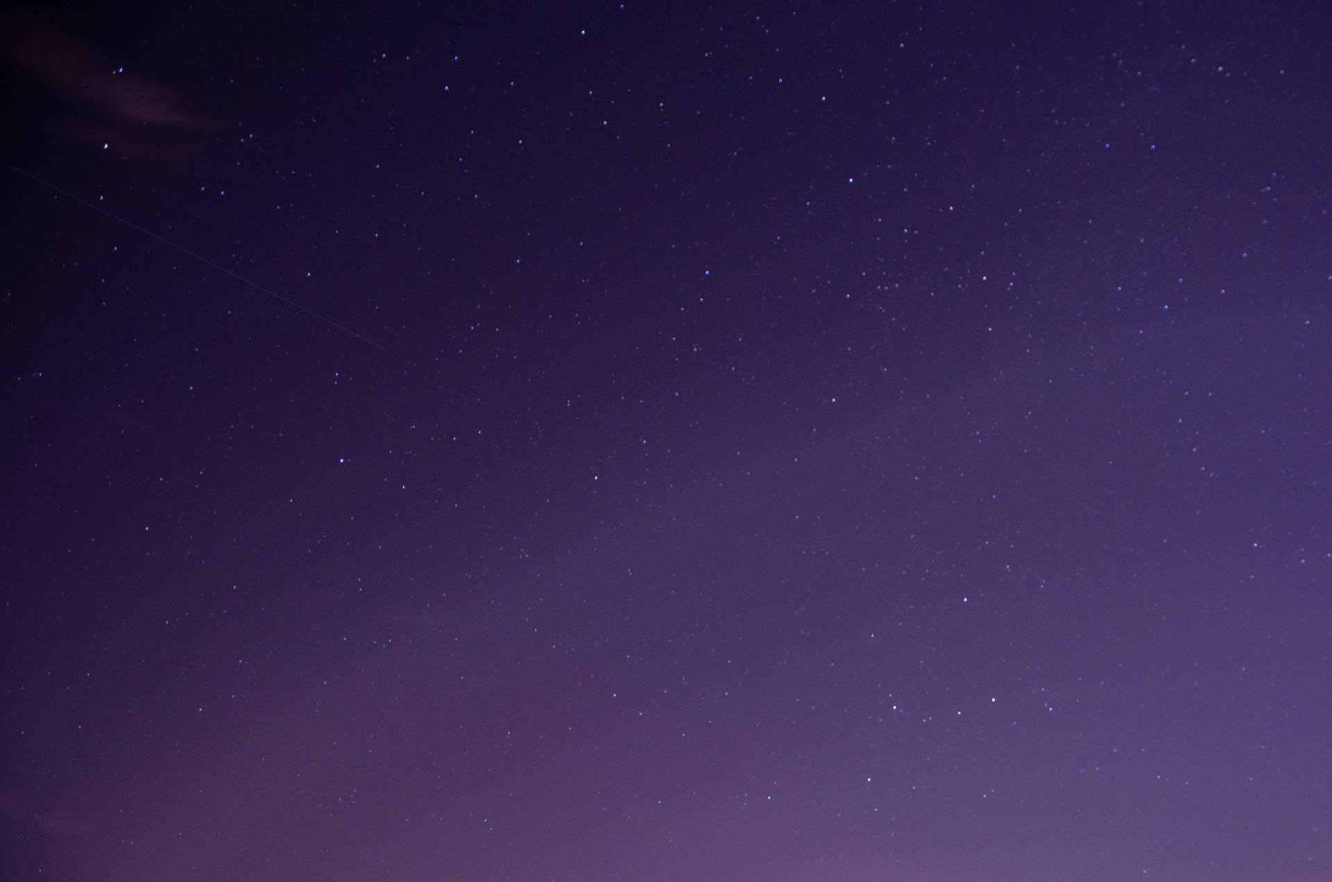Tiny Stars In Purple Night Sky Wallpaper