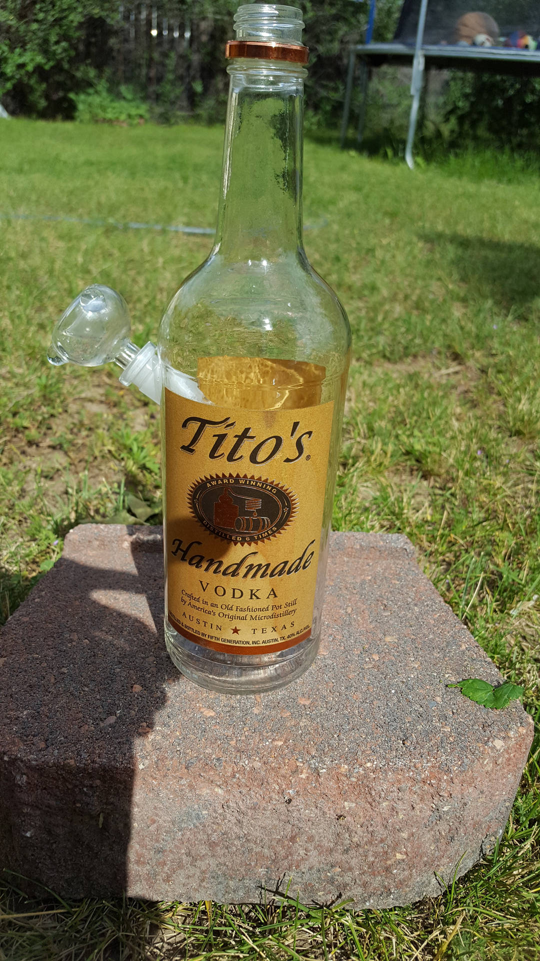 Titos Vodka Empty Glass Bottle Wallpaper