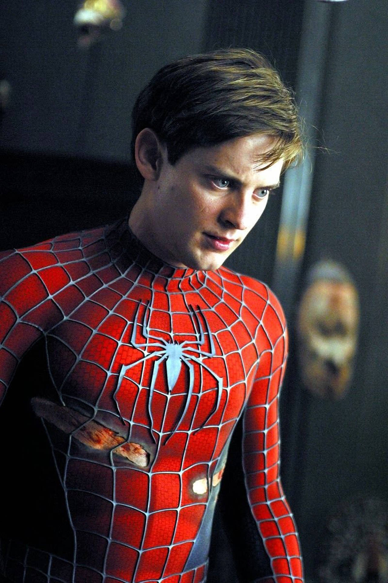 Tobey Maguire In Ripped Spider-Man Suit Wallpaper