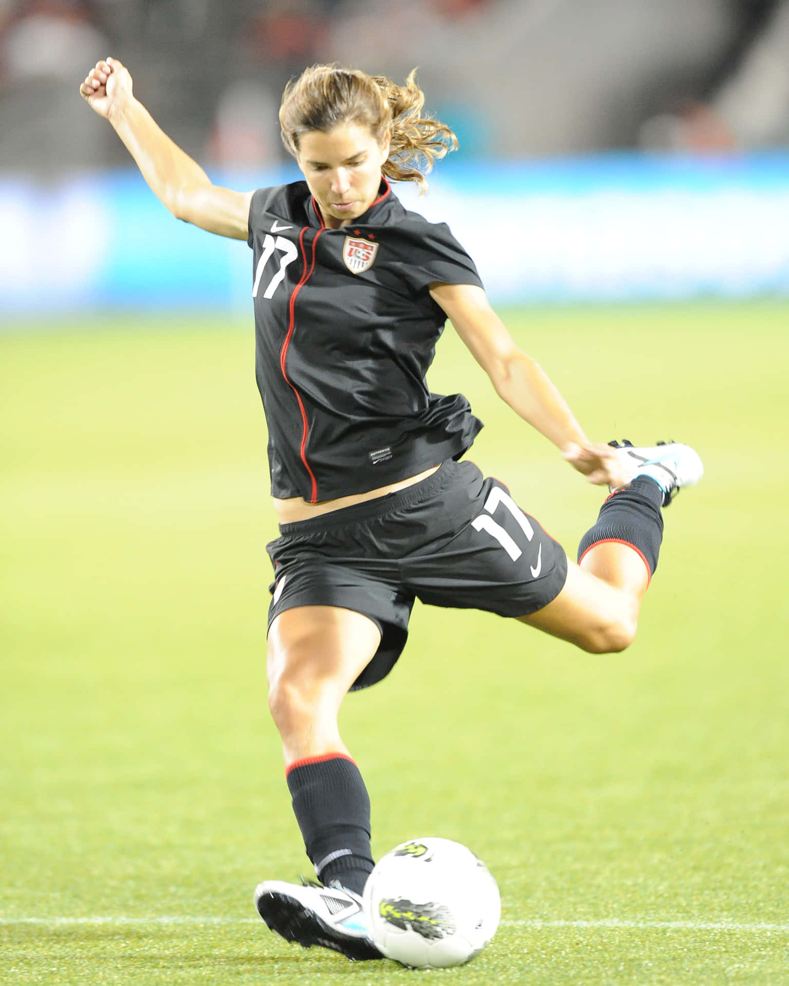 Tobin Heath: A Football Phenomenon In Action Wallpaper