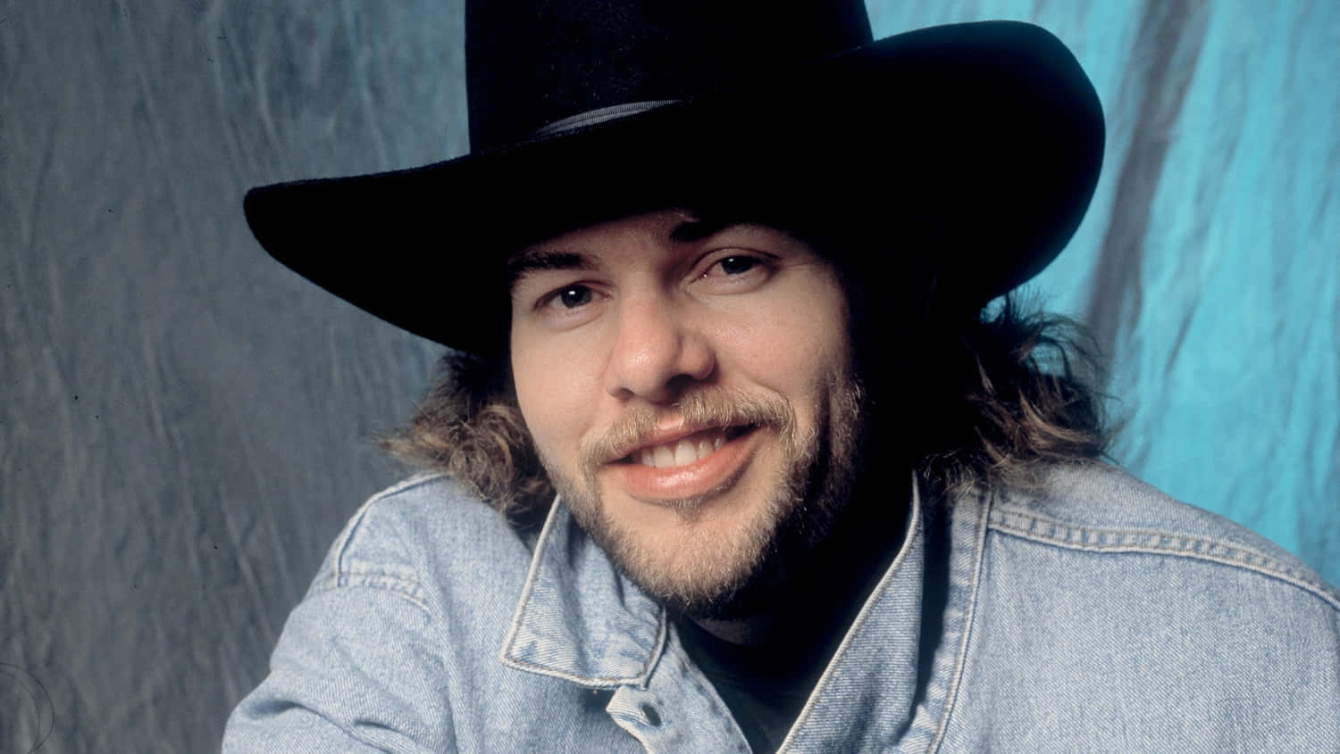 Toby Keith Smilingin Denimand Cowboy Hat Wallpaper