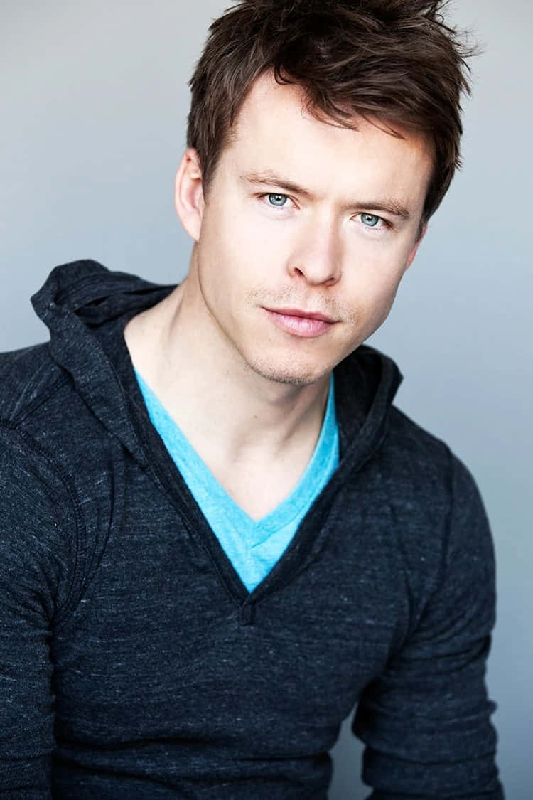 Download Todd Lasance Headshotin Hoodie Wallpaper | Wallpapers.com