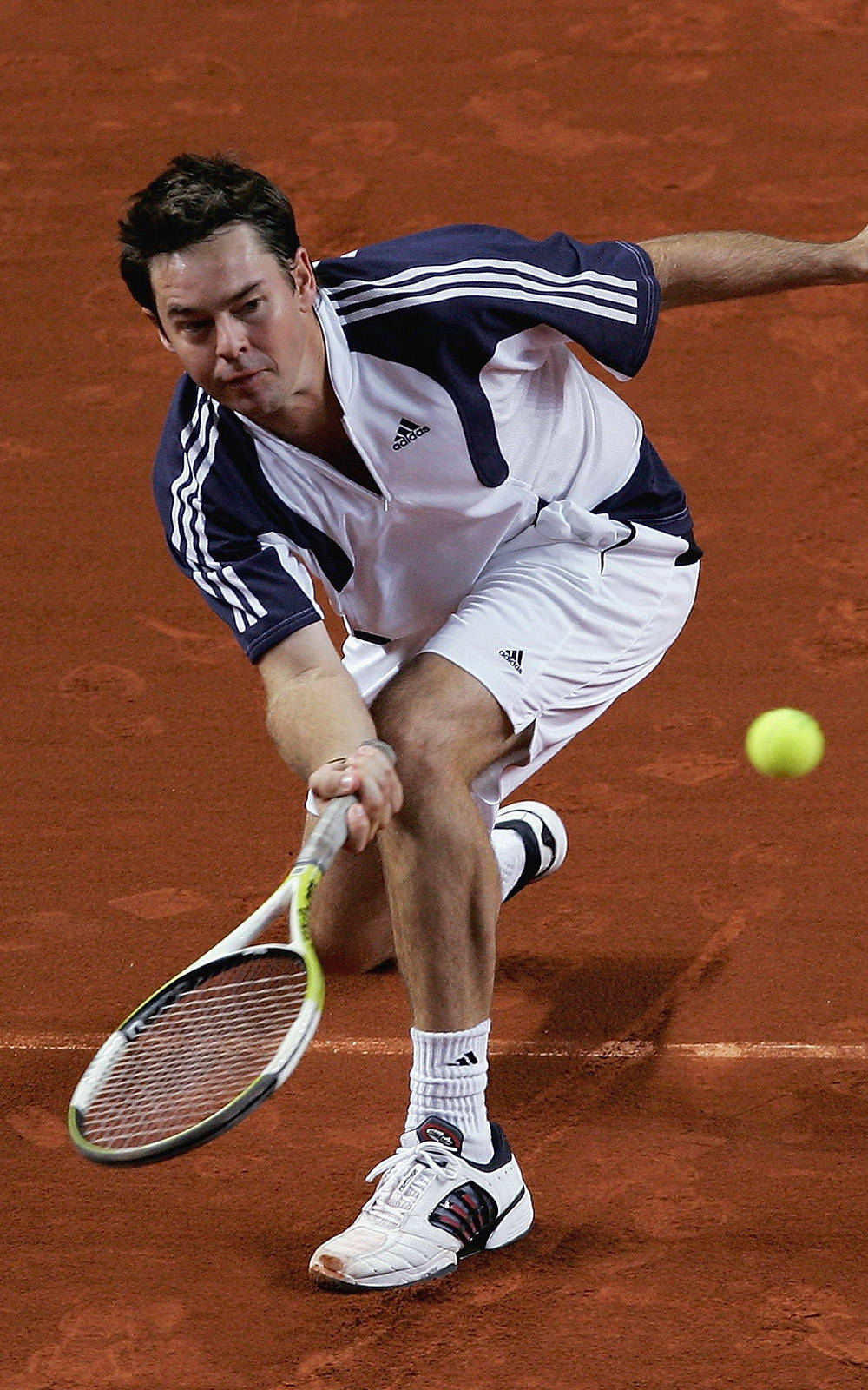 Toddwoodbridge Low Backhand Refers To A Technique Used In Tennis, Where The Player, Todd Woodbridge, Performs A Low Backhand Shot. Wallpaper