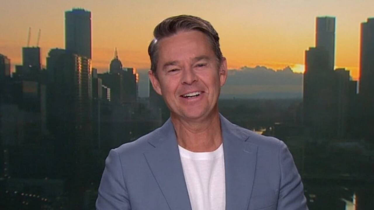 Todd Woodbridge Offering Commentary on Television Wallpaper