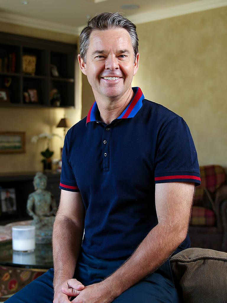 Todd Woodbridge Posing On Couch Wallpaper