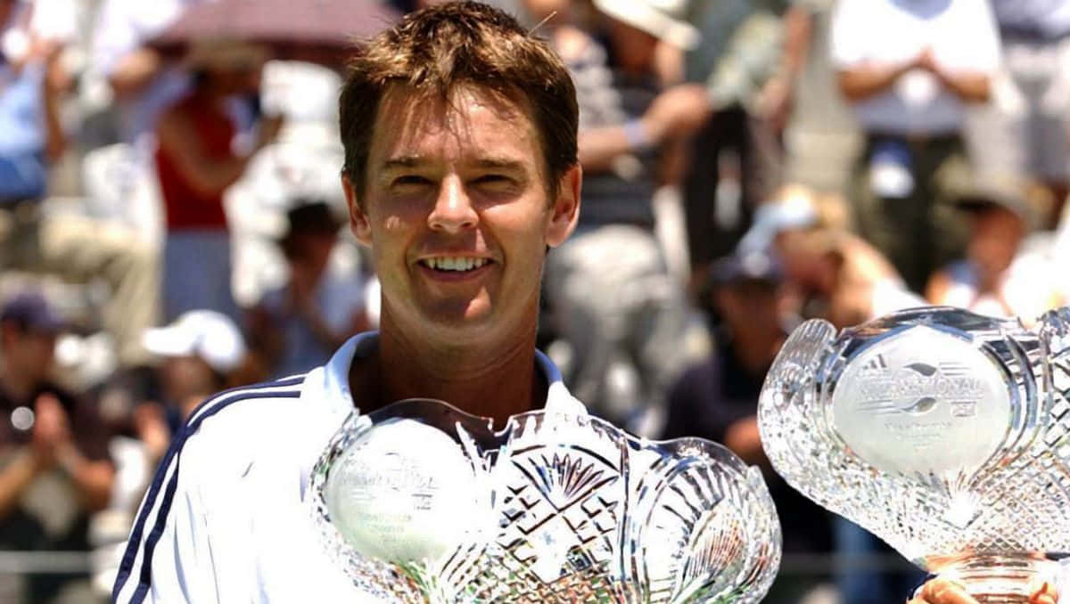 Todd Woodbridge With Crystal Trophy Wallpaper