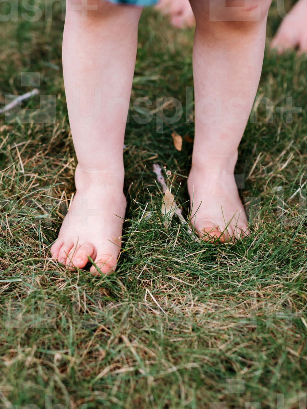 Toddler Toes On Grass Wallpaper