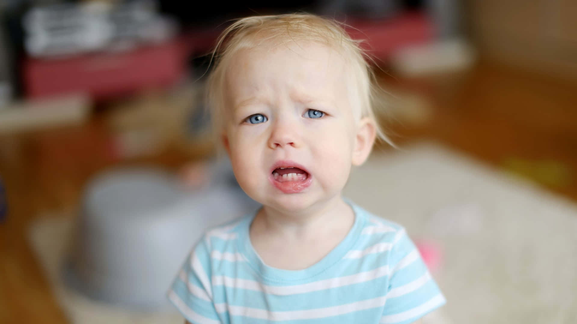 Toddler Whining Expression Wallpaper
