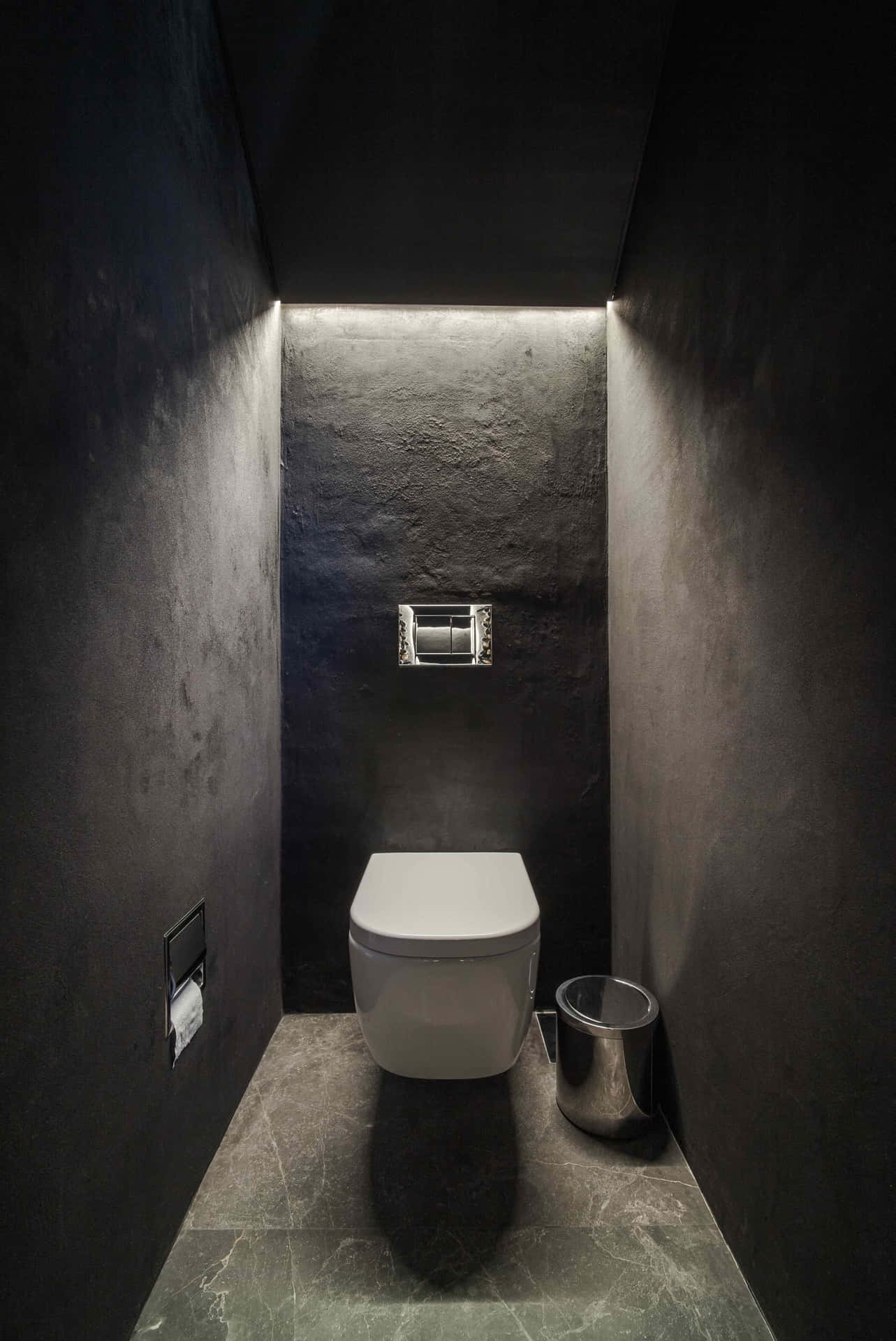 Modern, pristine white toilet in a sleek and stylish bathroom