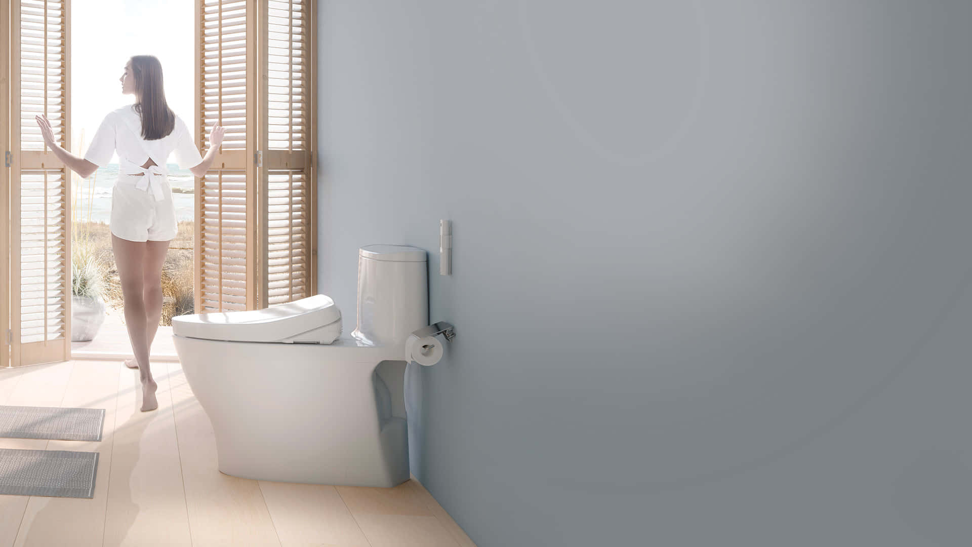 "A Modern Toilet in a Clean Bathroom"