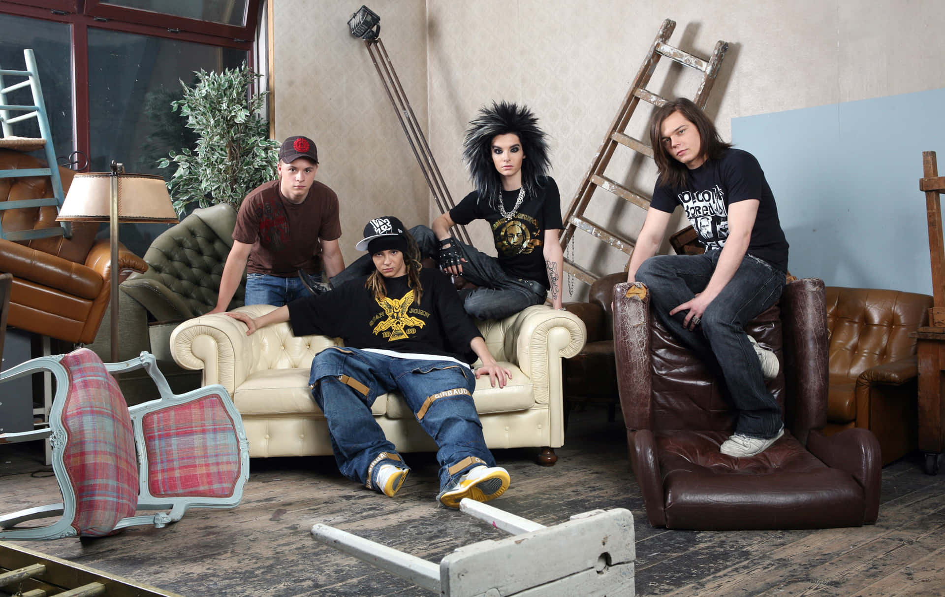 Tokio Hotel Band Membersin Disheveled Room Wallpaper