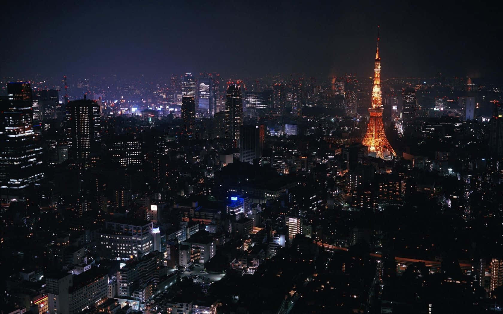Fondode Pantalla De Tokio Con Vista De La Ciudad En Tono Oscuro.