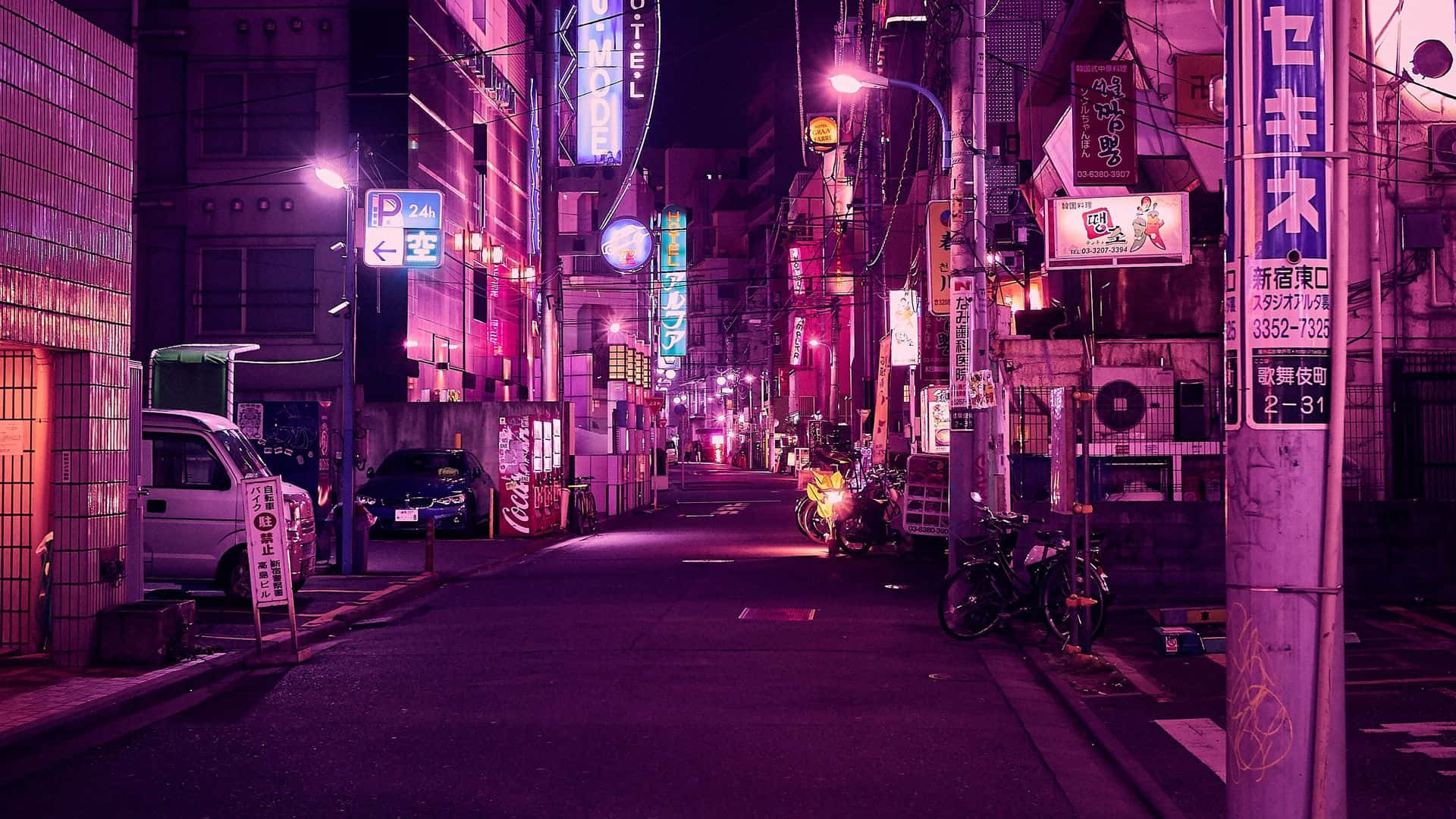 Fundode Tela De Rua Em Tóquio Com Luzes De Tons Roxos