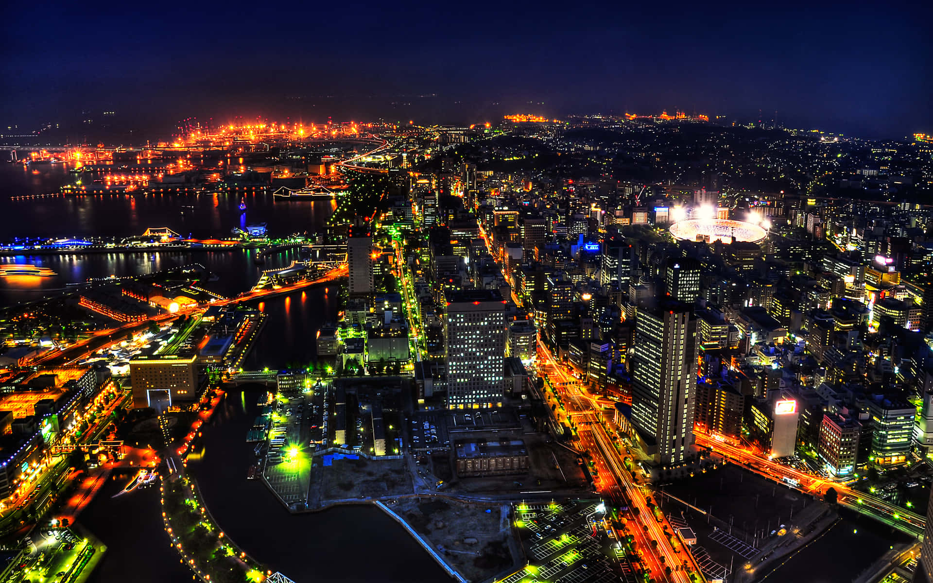 Hintergrundbildvon Tokio Mit Gelben Und Grünen Stadtleuchten.