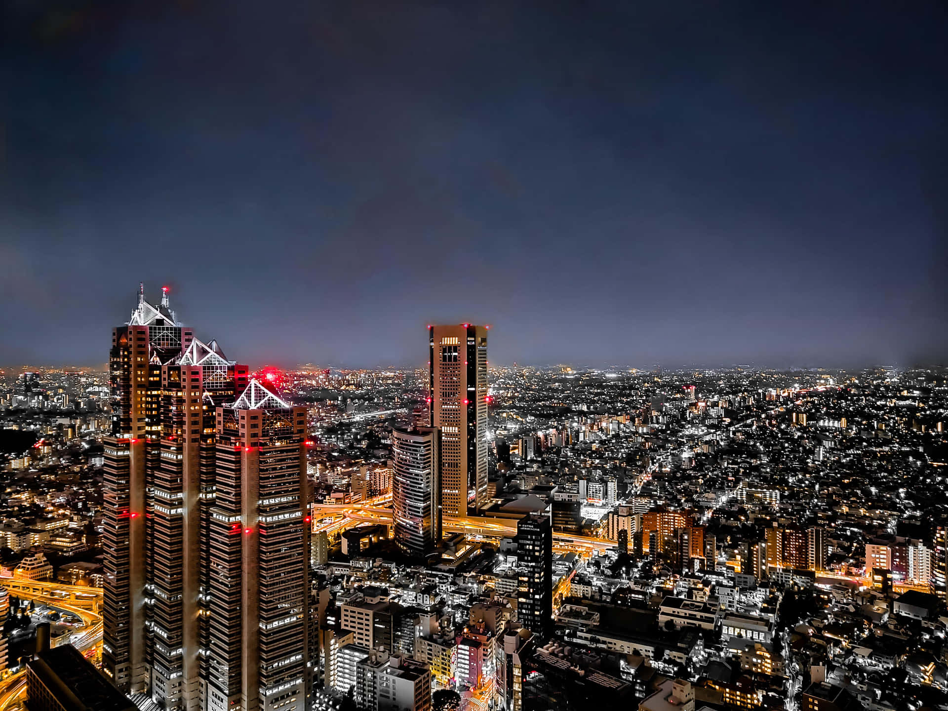 Imagende La Ciudad De Tokio De Noche Con Edificios Altos