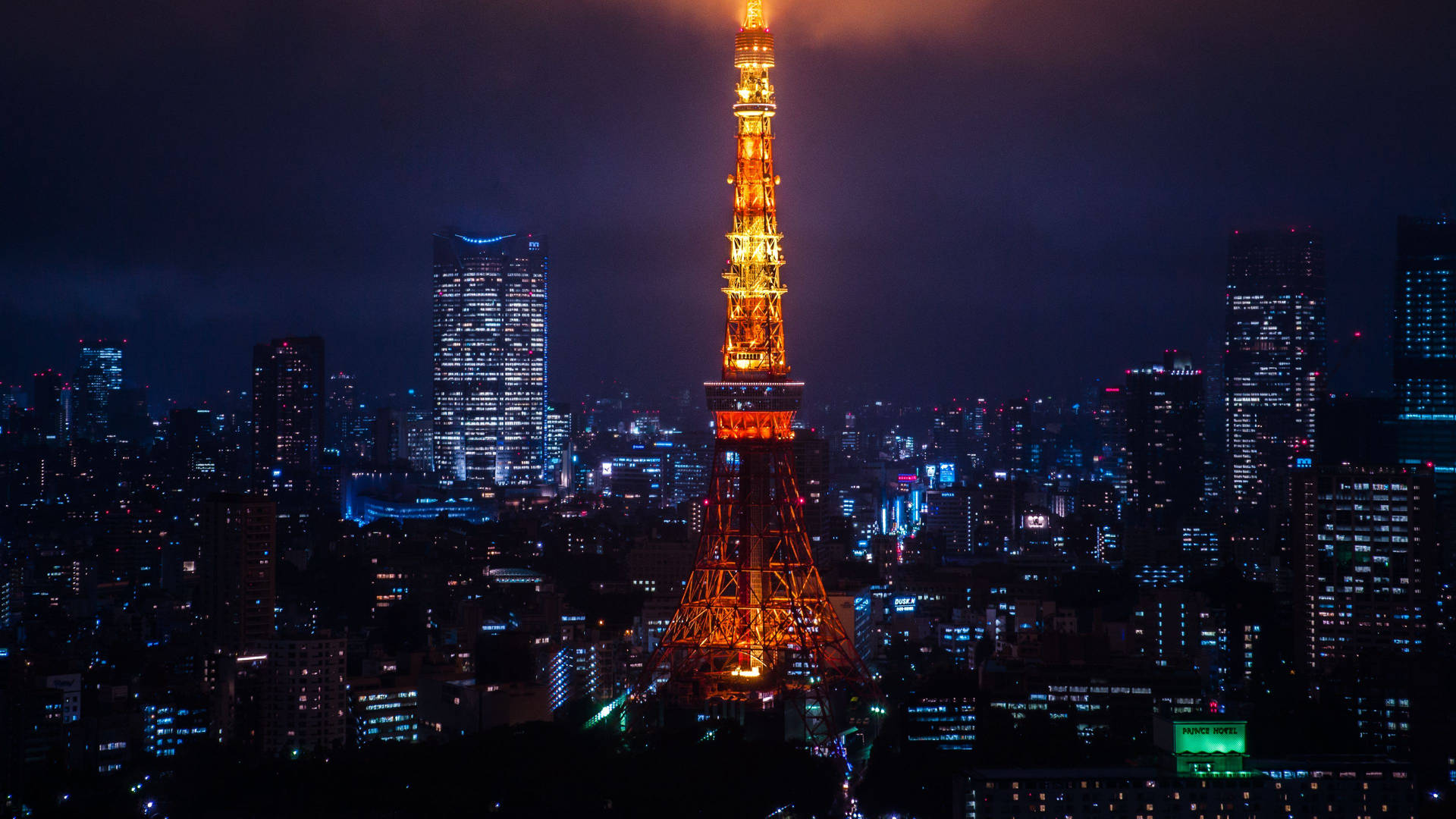 Tokyo Tower Lit Up At Night Wallpaper