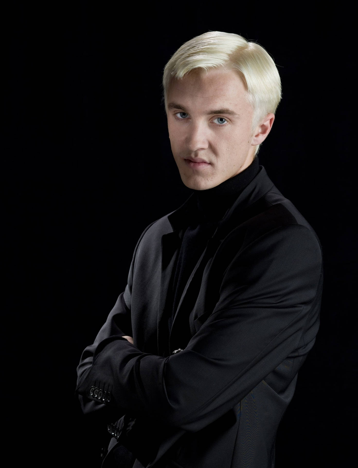 Tom Felton Playing As Draco Malfoy Wallpaper