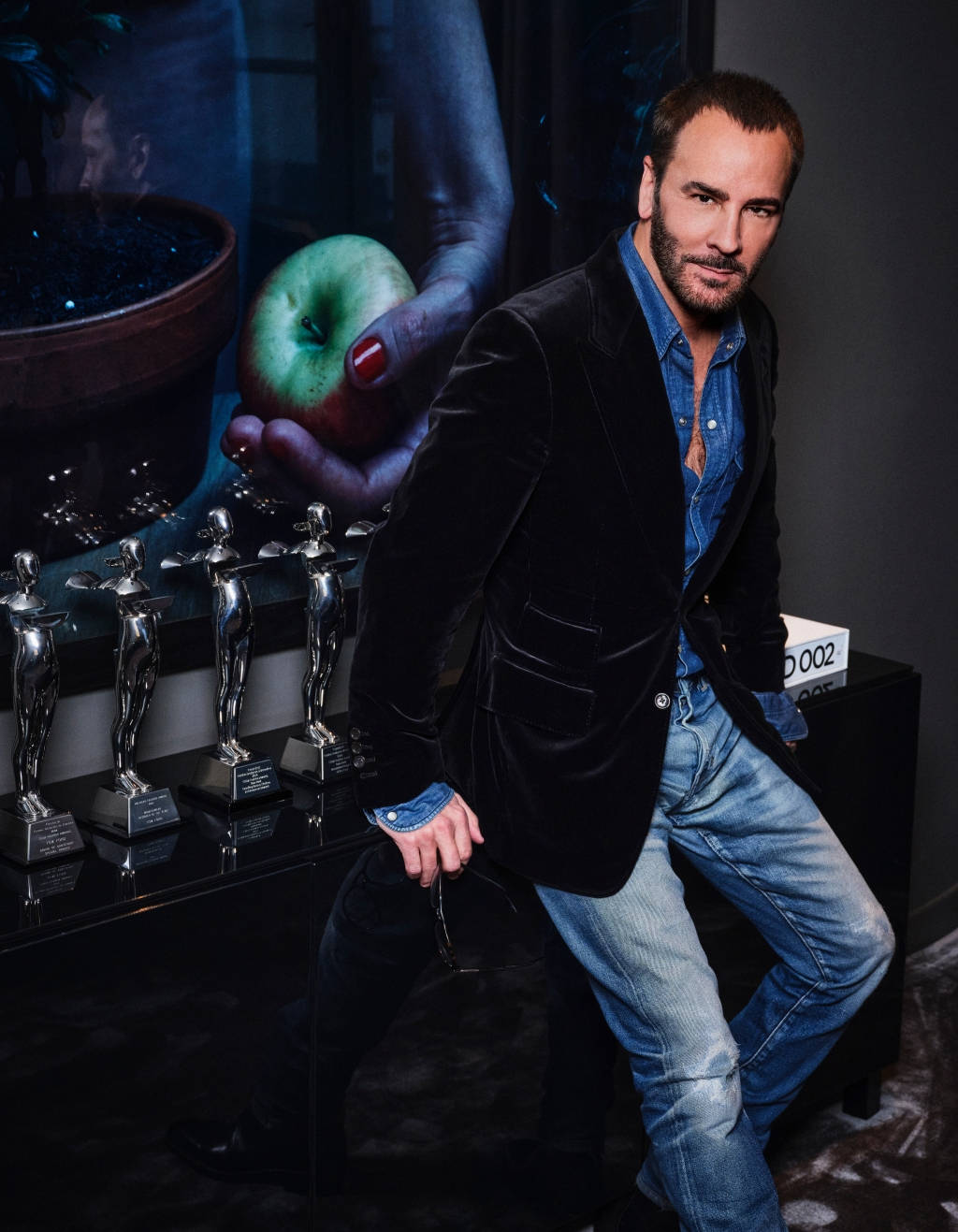 Tom Ford Posing With Awards Background