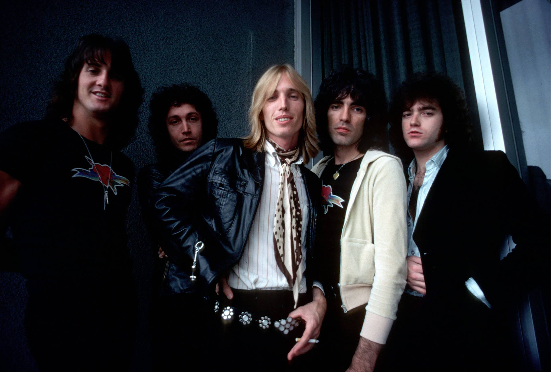 Legendary Band Tom Petty And The Heartbreakers Backstage in 1977 Wallpaper