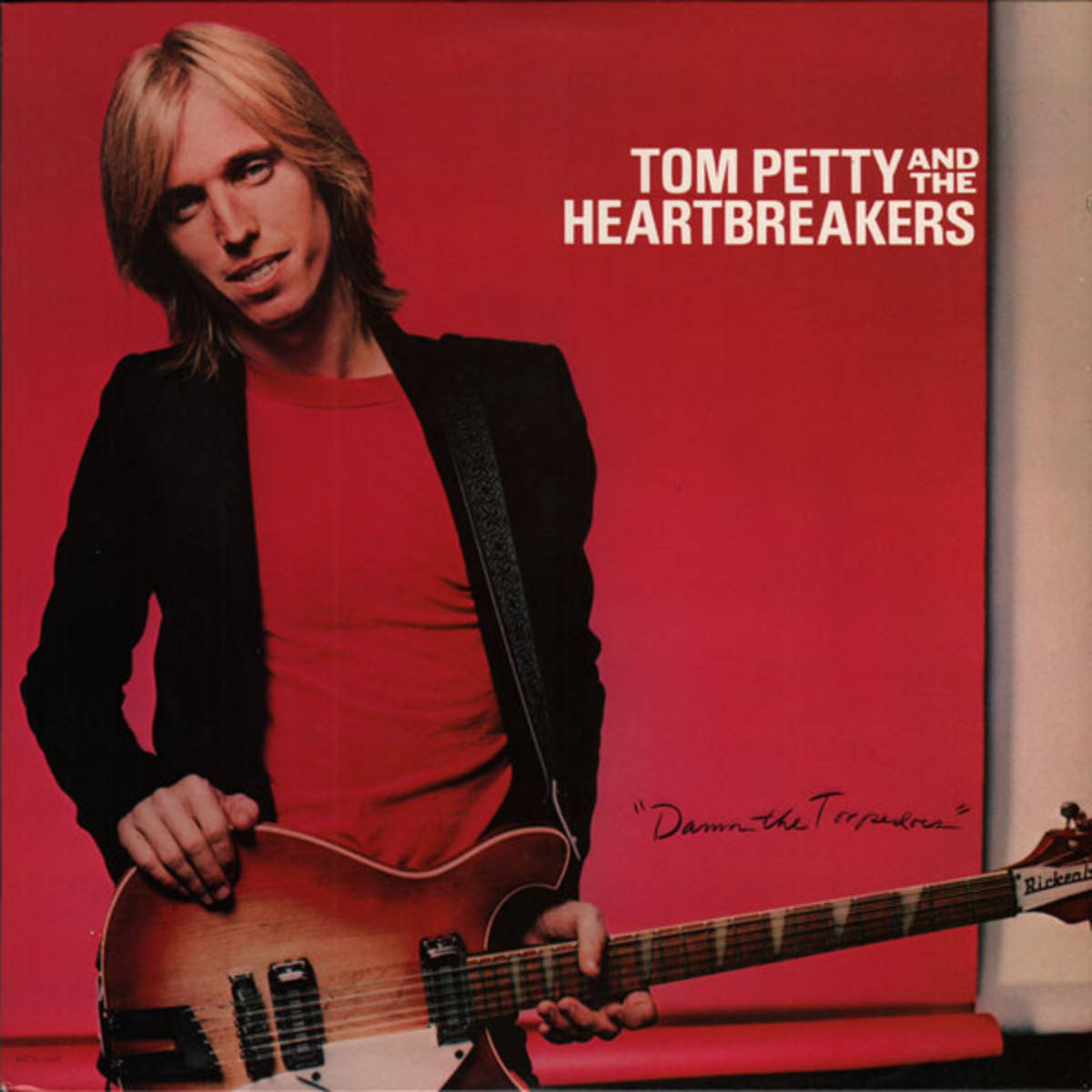 Caption: Tom Petty and The Heartbreakers: Damn the Torpedoes Album Cover Wallpaper