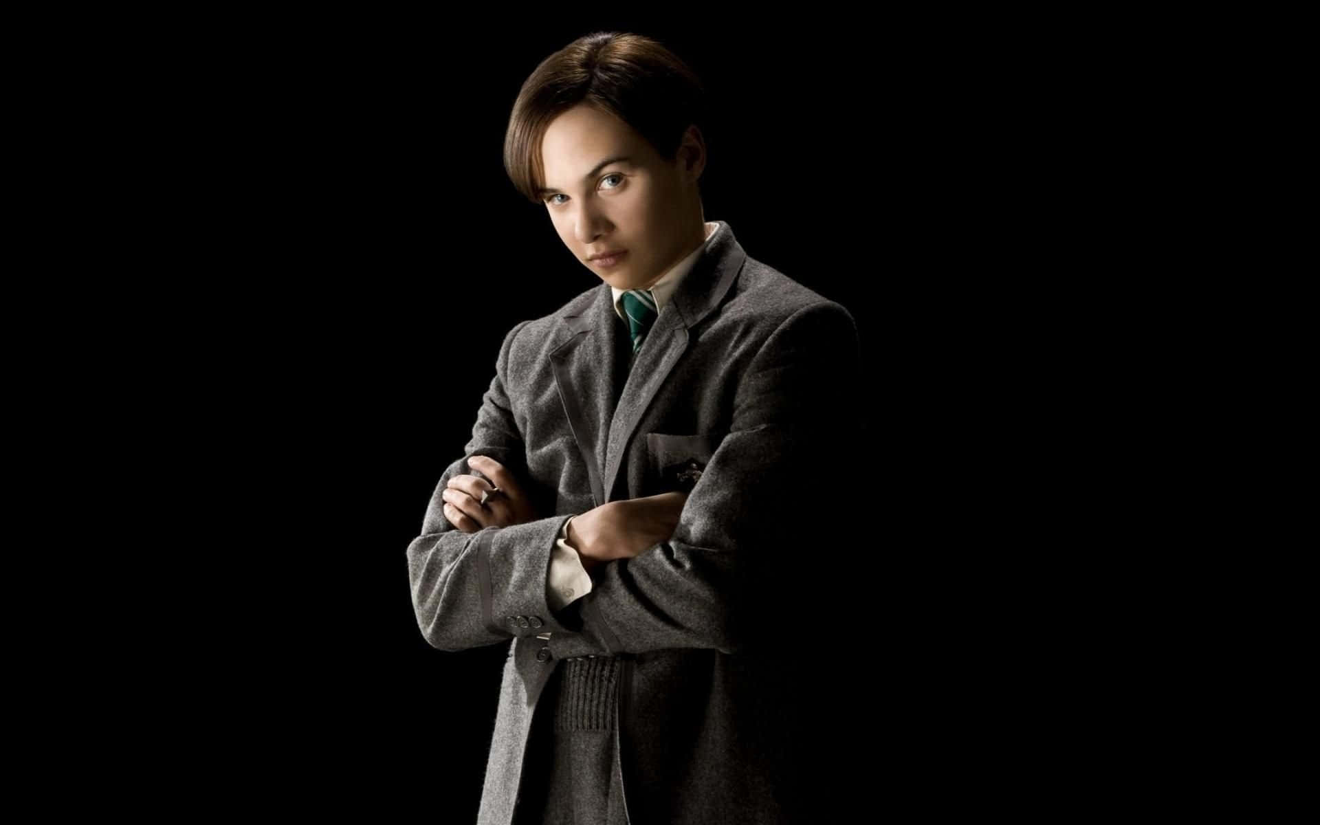 Intriguing, young Tom Riddle with a dark glint in his eyes. Wallpaper