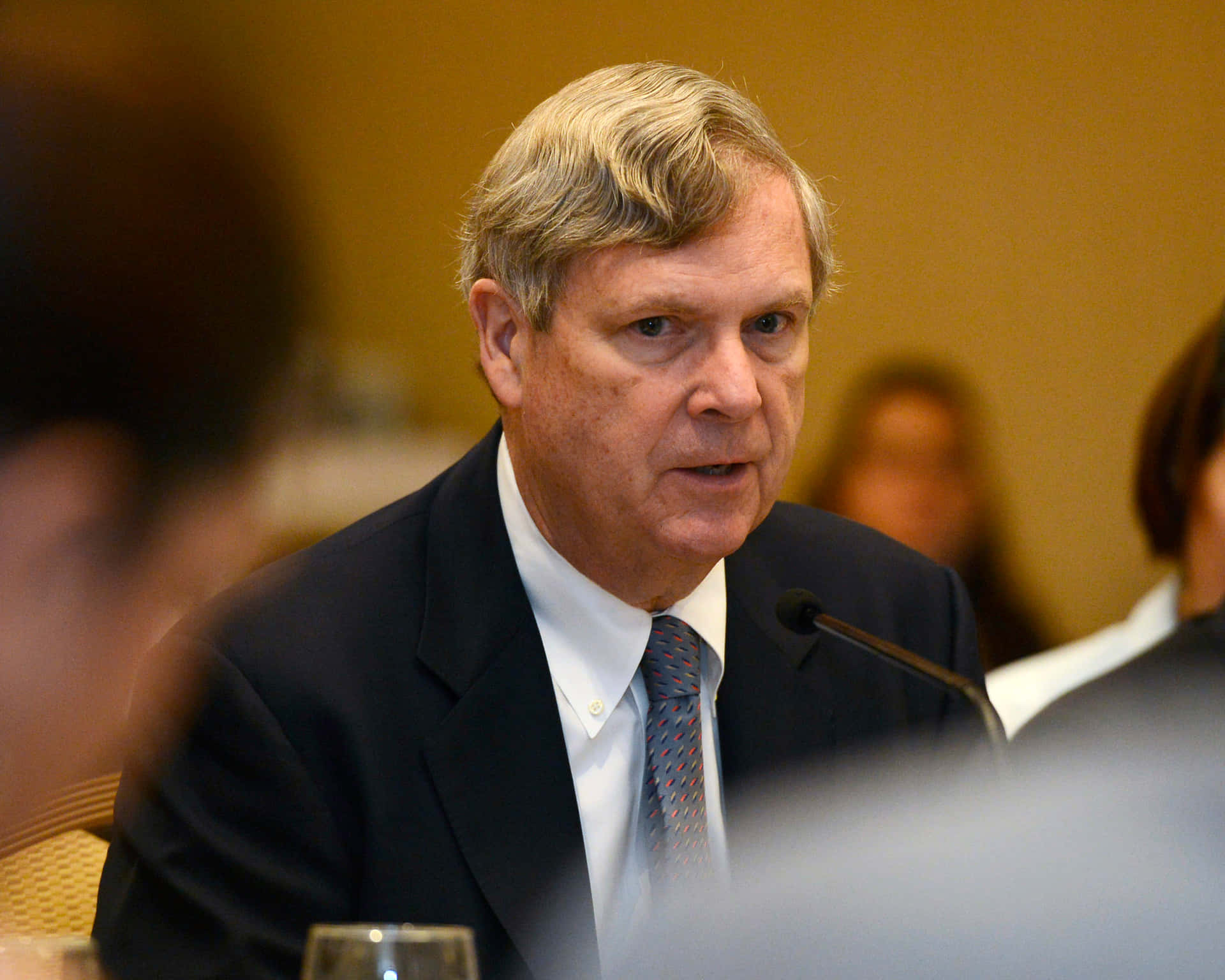Tom Vilsack With Serious Expression Wallpaper