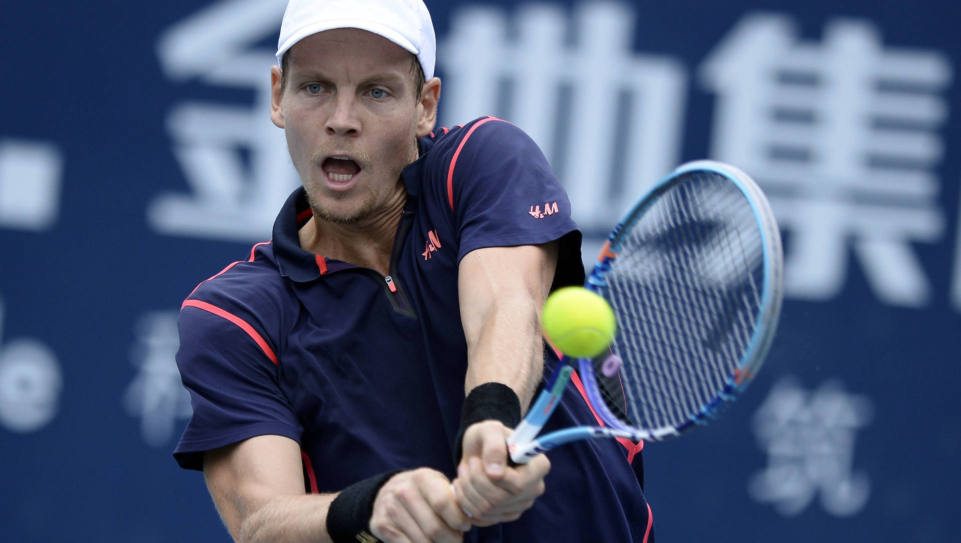 Tomas Berdych Swinging To Hit The Ball Wallpaper