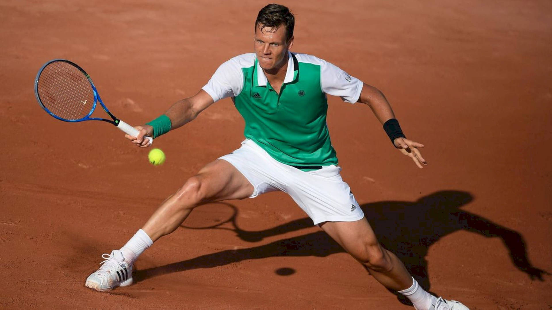 Tomas Berdych Trying To Hit Ball Wallpaper