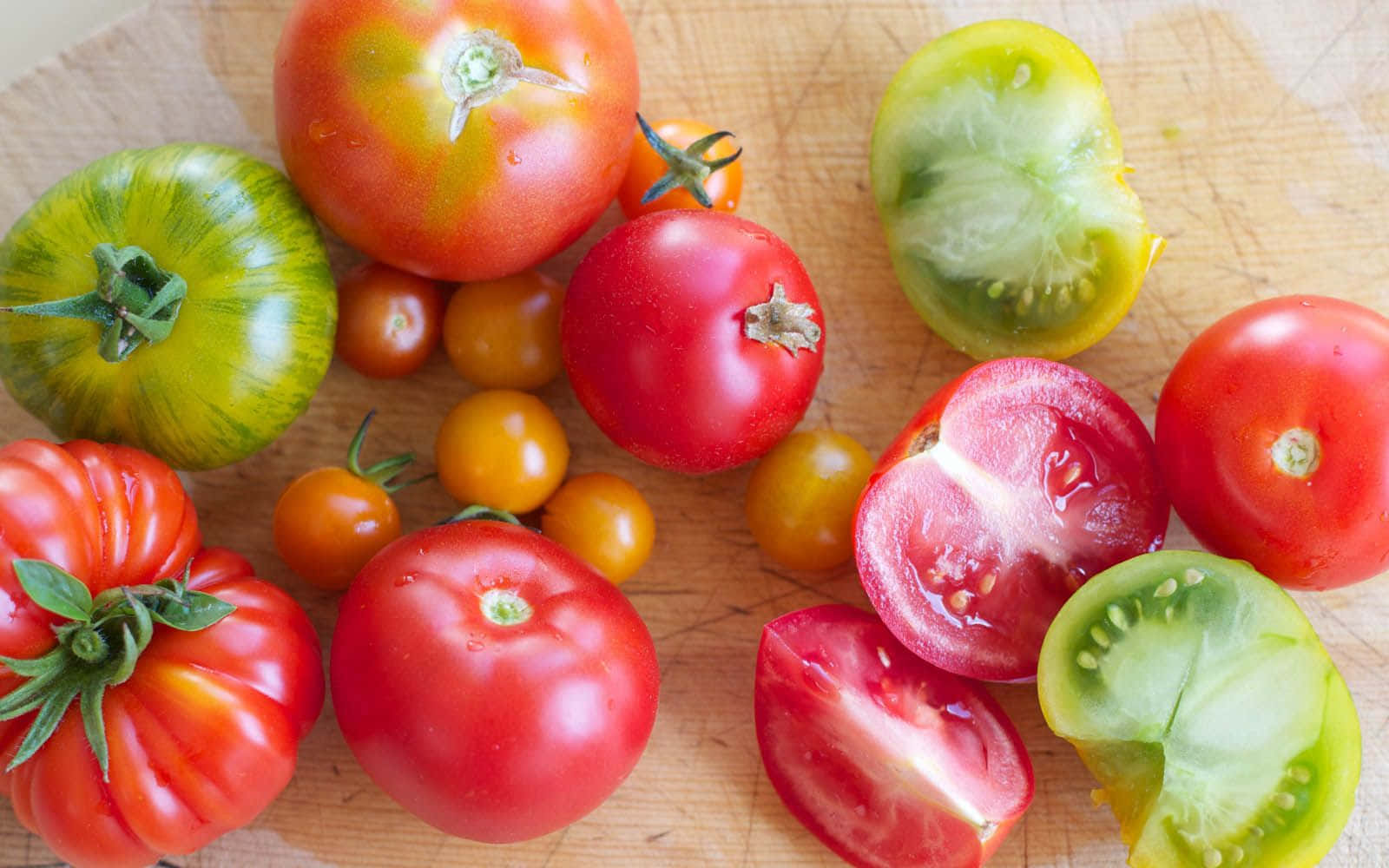 "Nom nom! Ripe and juicy red tomatoes ready to be enjoyed!"