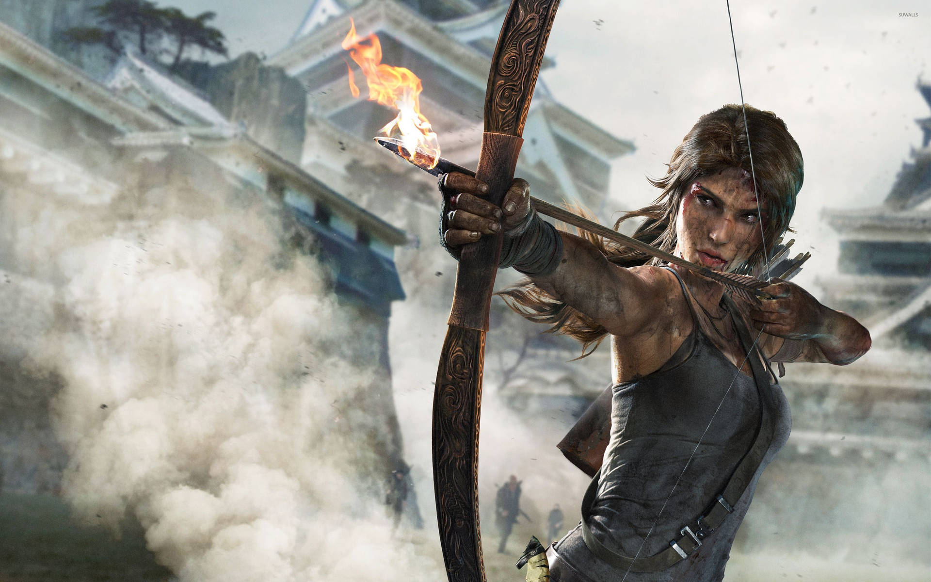 Laura Croft i aktion, da hun springer fra et tag til et andet i den seneste Tomb Raider-spil. Wallpaper