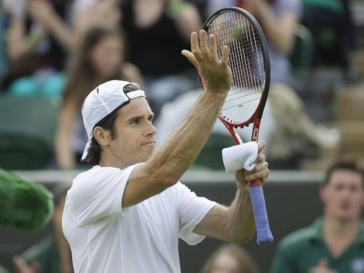 Tommy Haas Clapping On Racket Wallpaper