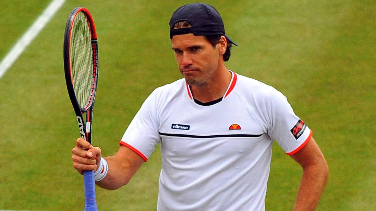 Tommy Haas Holding Up Racket Wallpaper