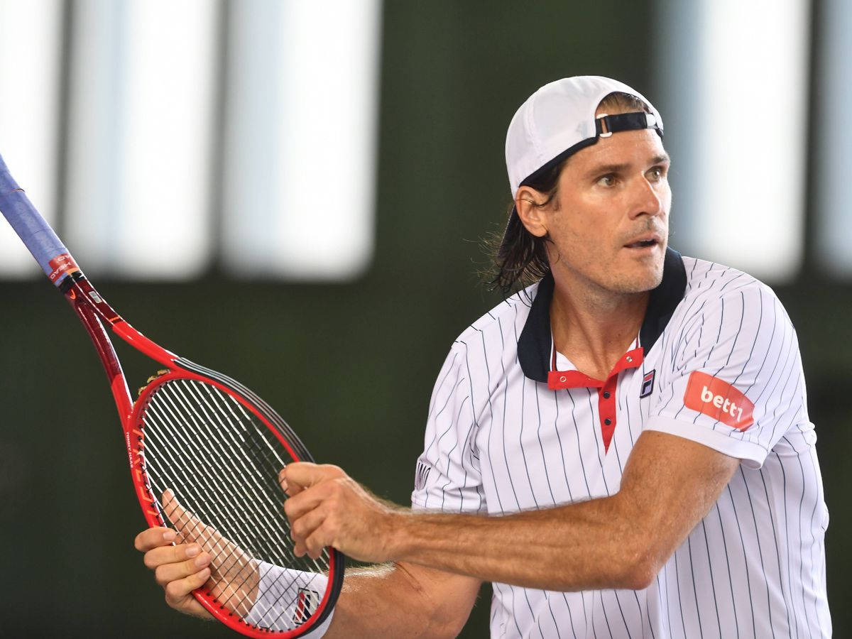 Tommy Haas With Upside Down Racket Wallpaper