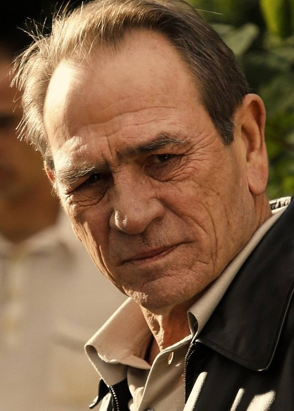 Legendary Actor Tommy Lee Jones With a Dazzling Smile Wallpaper