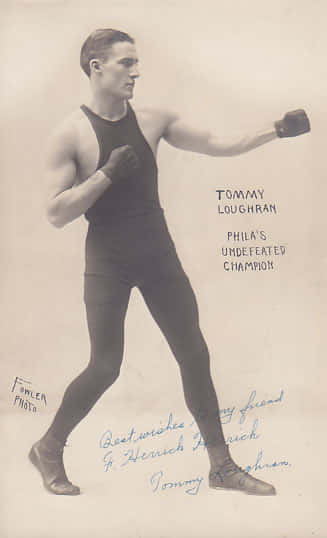 Tommyloughran In Schwarzer Sportkleidung Wallpaper