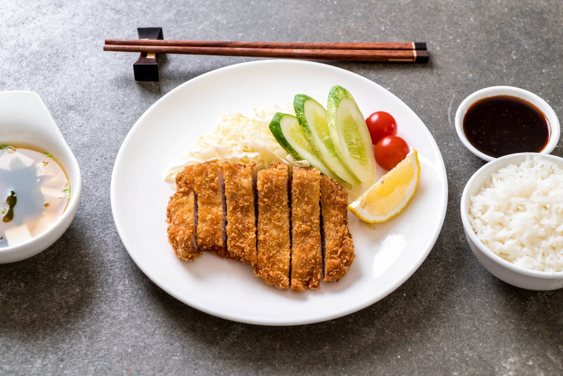 Authentic Tonkatsu Pork Cutlet with Fresh Cucumber Slices Wallpaper
