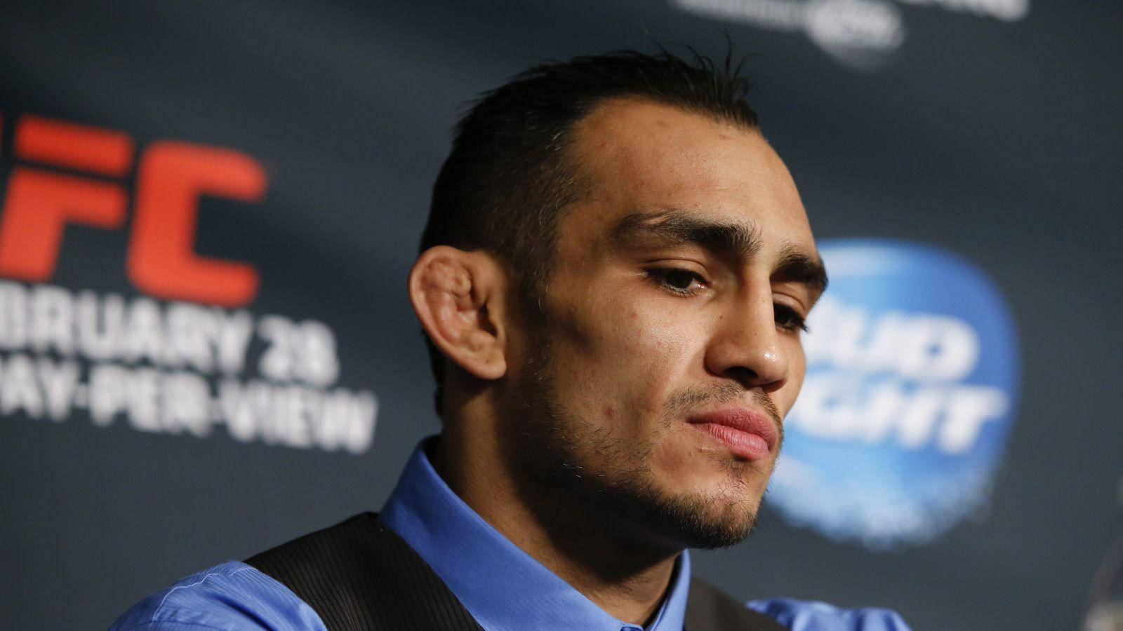 Download Tony Ferguson confidently speaking at a press conference Wallpaper  | Wallpapers.com