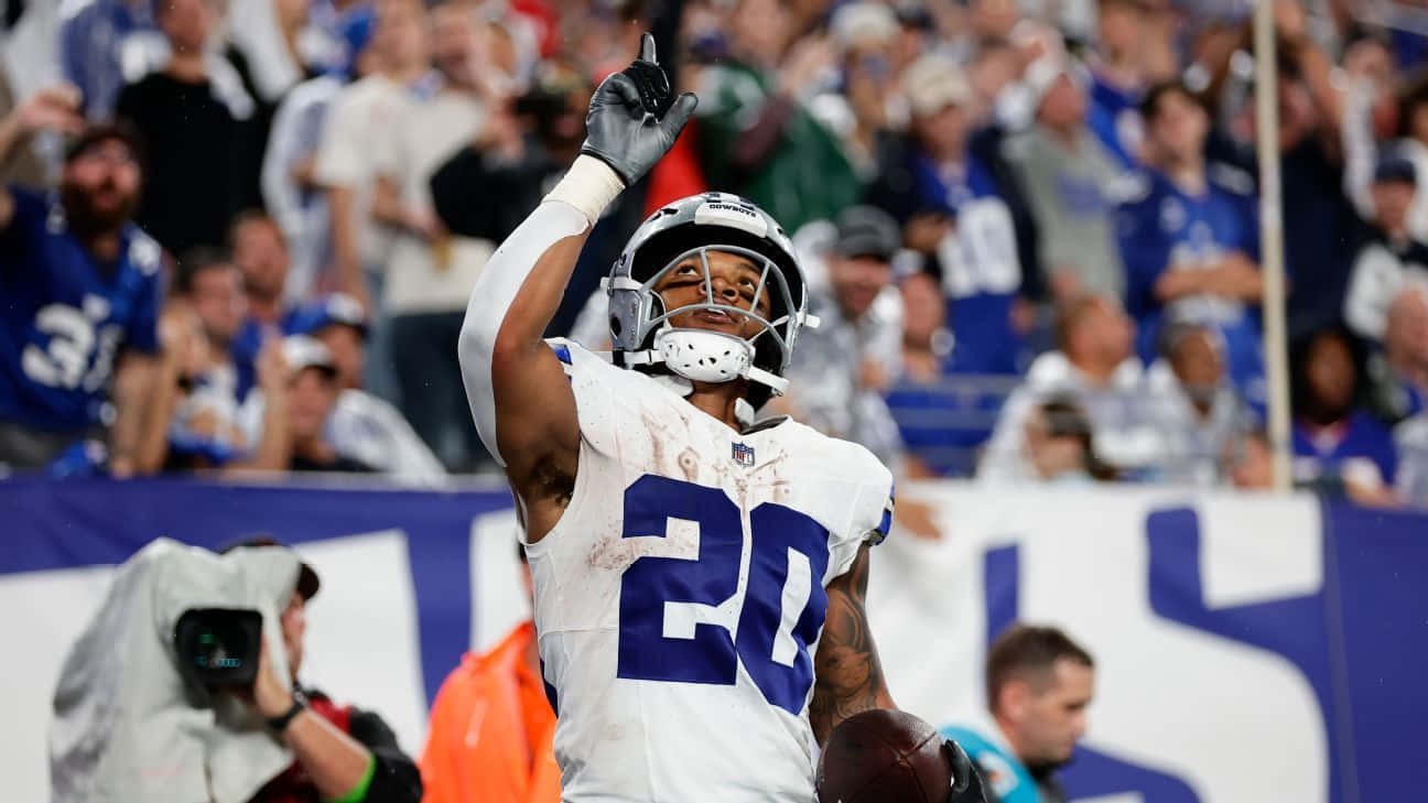 Tony Pollard Célébrant Un Touchdown Fond d'écran