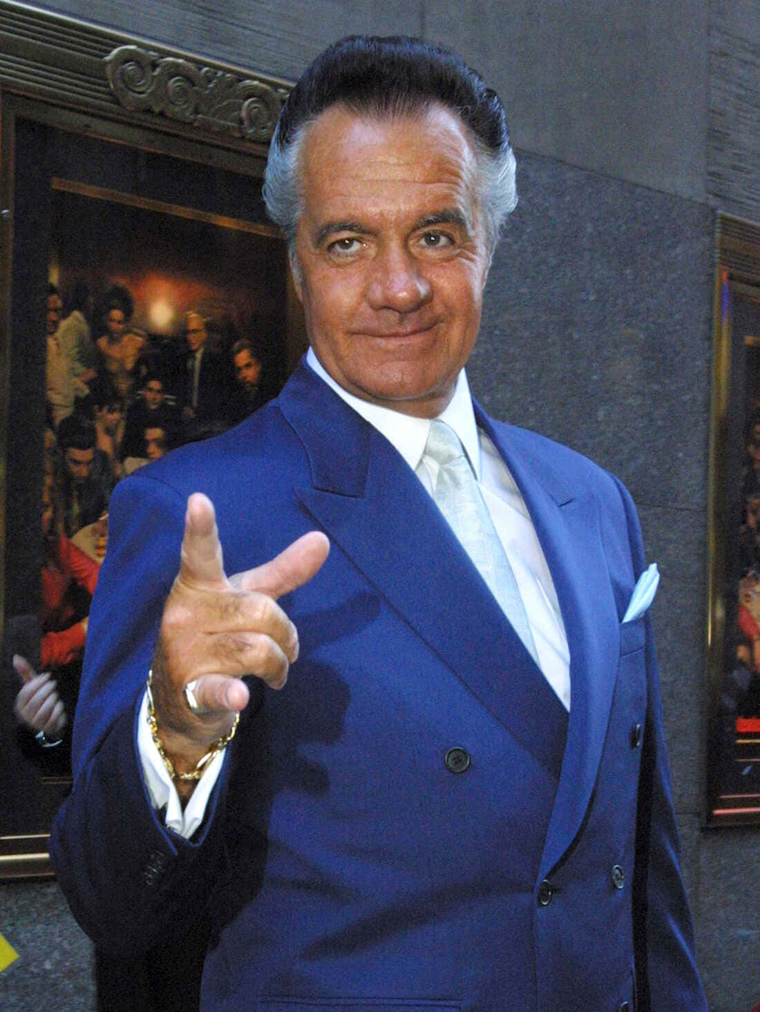 Tony Sirico striking a pose in a black suit Wallpaper