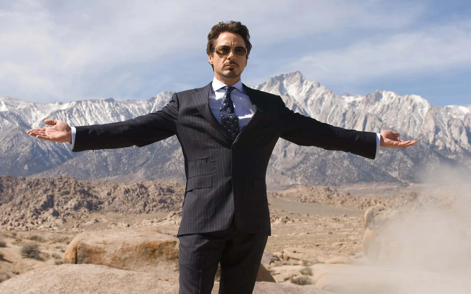 Tony Stark Desert Pose Wallpaper