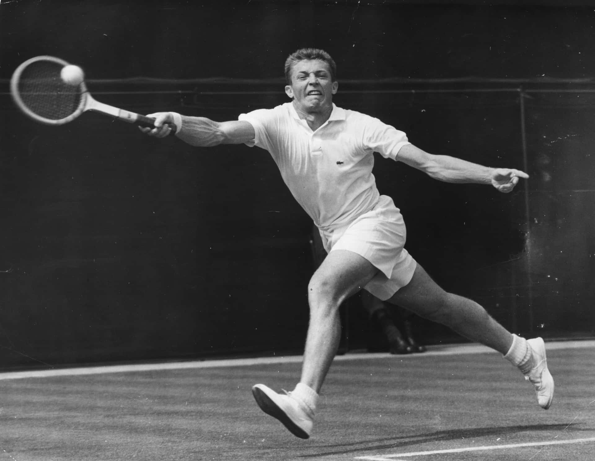 Tony Trabert Chasing The Tennis Ball Wallpaper