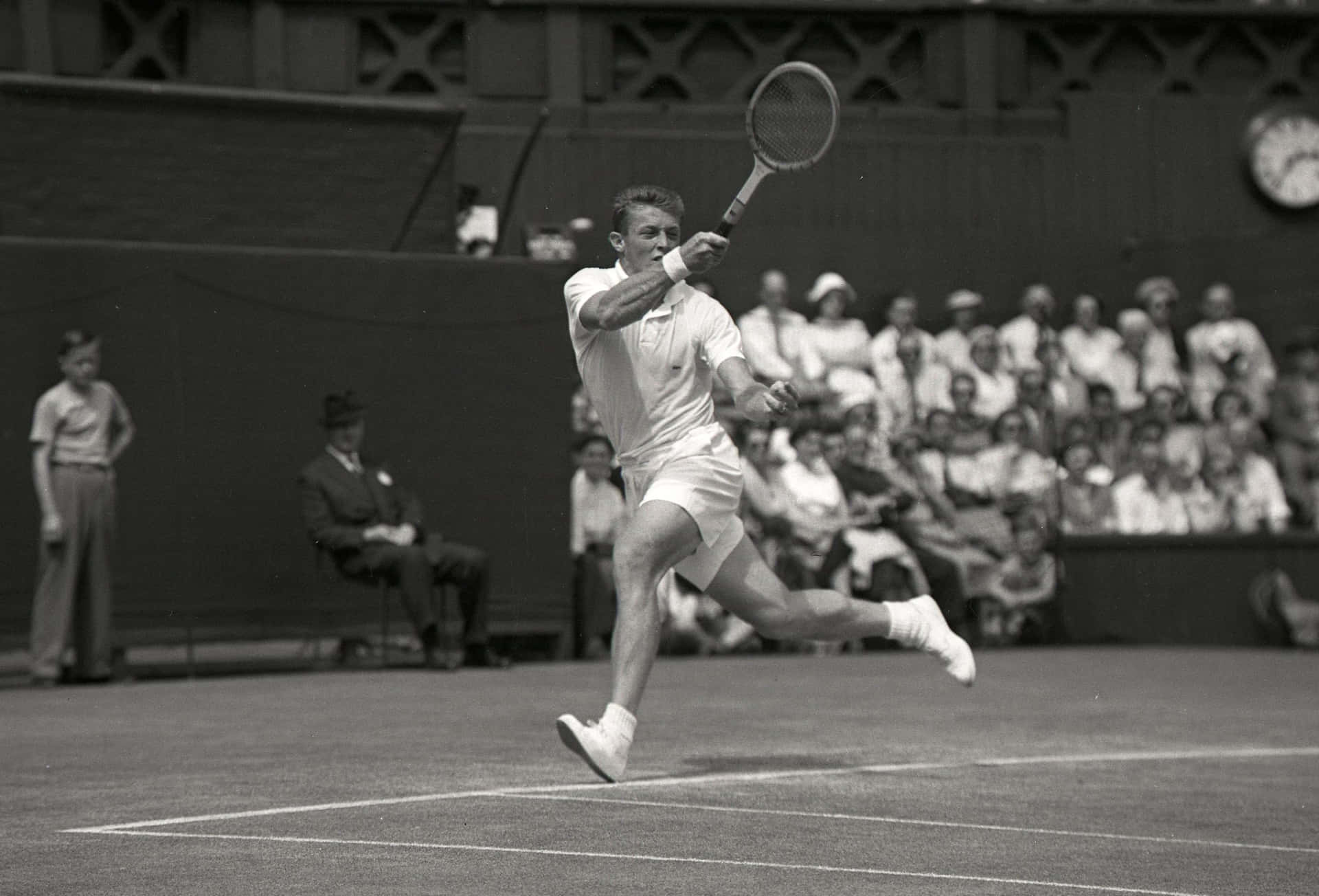 Caption: Tony Trabert - Dominating the Tennis Court Wallpaper