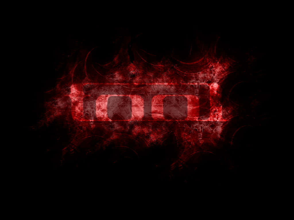 En rød logo med flammer på det. Wallpaper