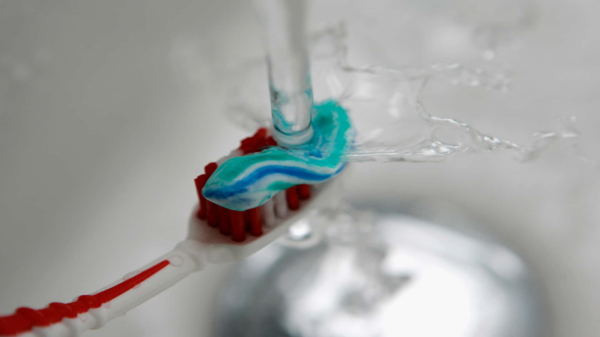 Download Toothbrush_with_ Toothpaste_and_ Water_ Stream Wallpaper