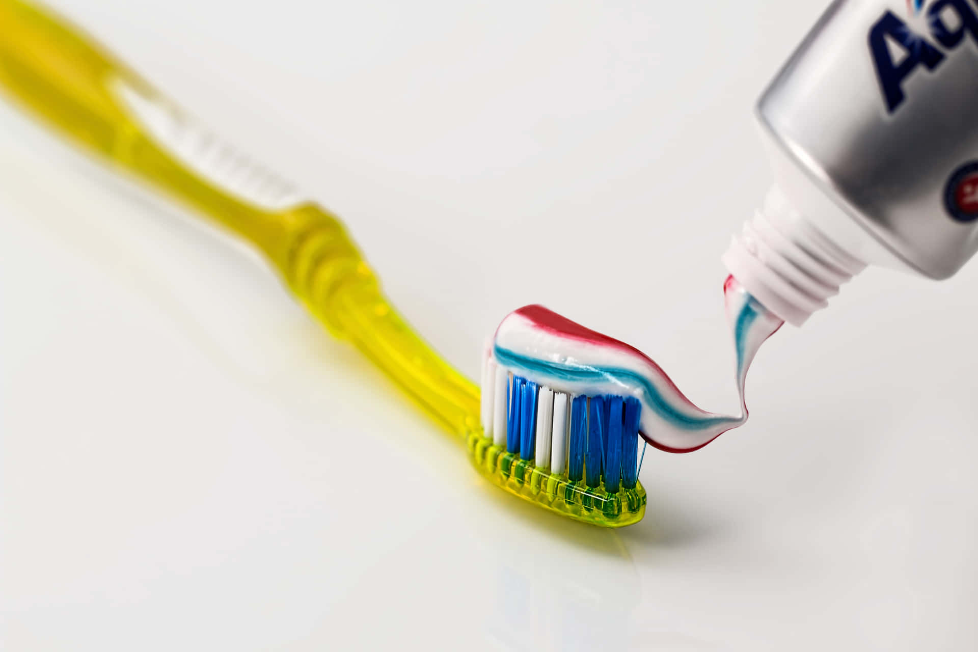 Toothpaste Dispensingon Toothbrush.jpg Wallpaper