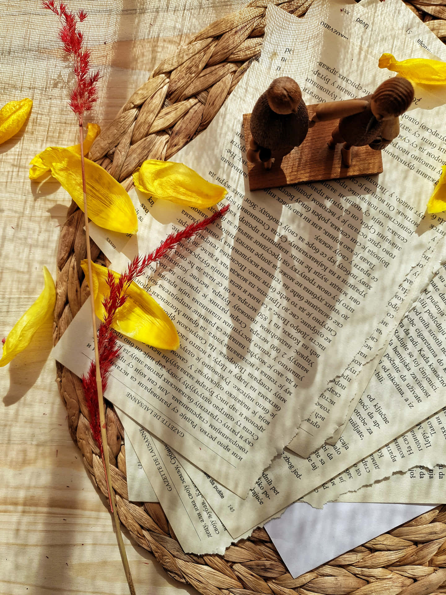 Torn Paper Pages On Basket Wallpaper