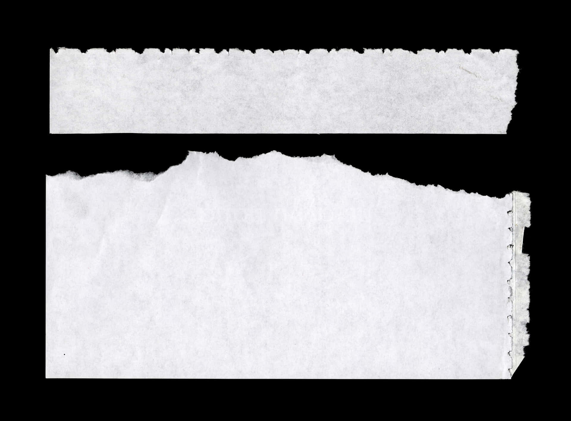 Two Pieces Of White Paper On A Black Background