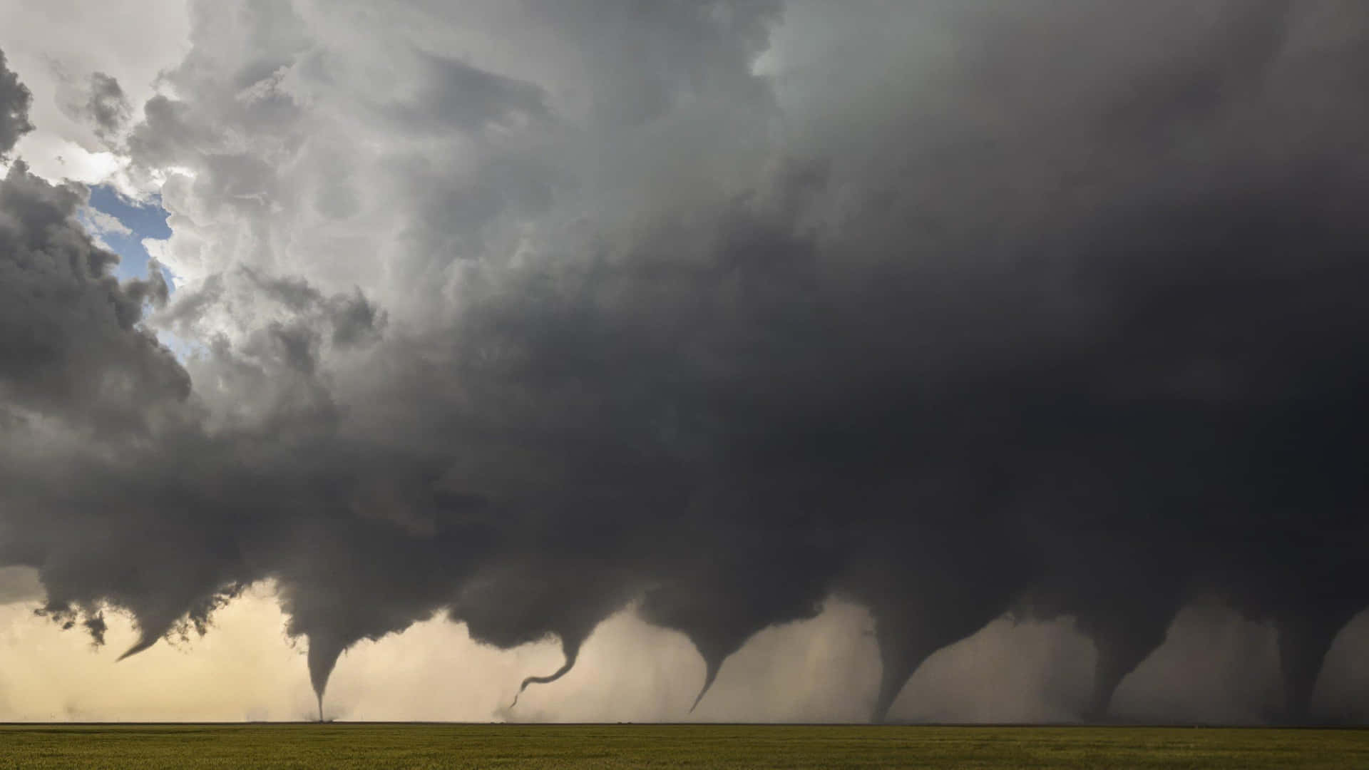 Captivating Tornado Formation Against a Stormy Sky
